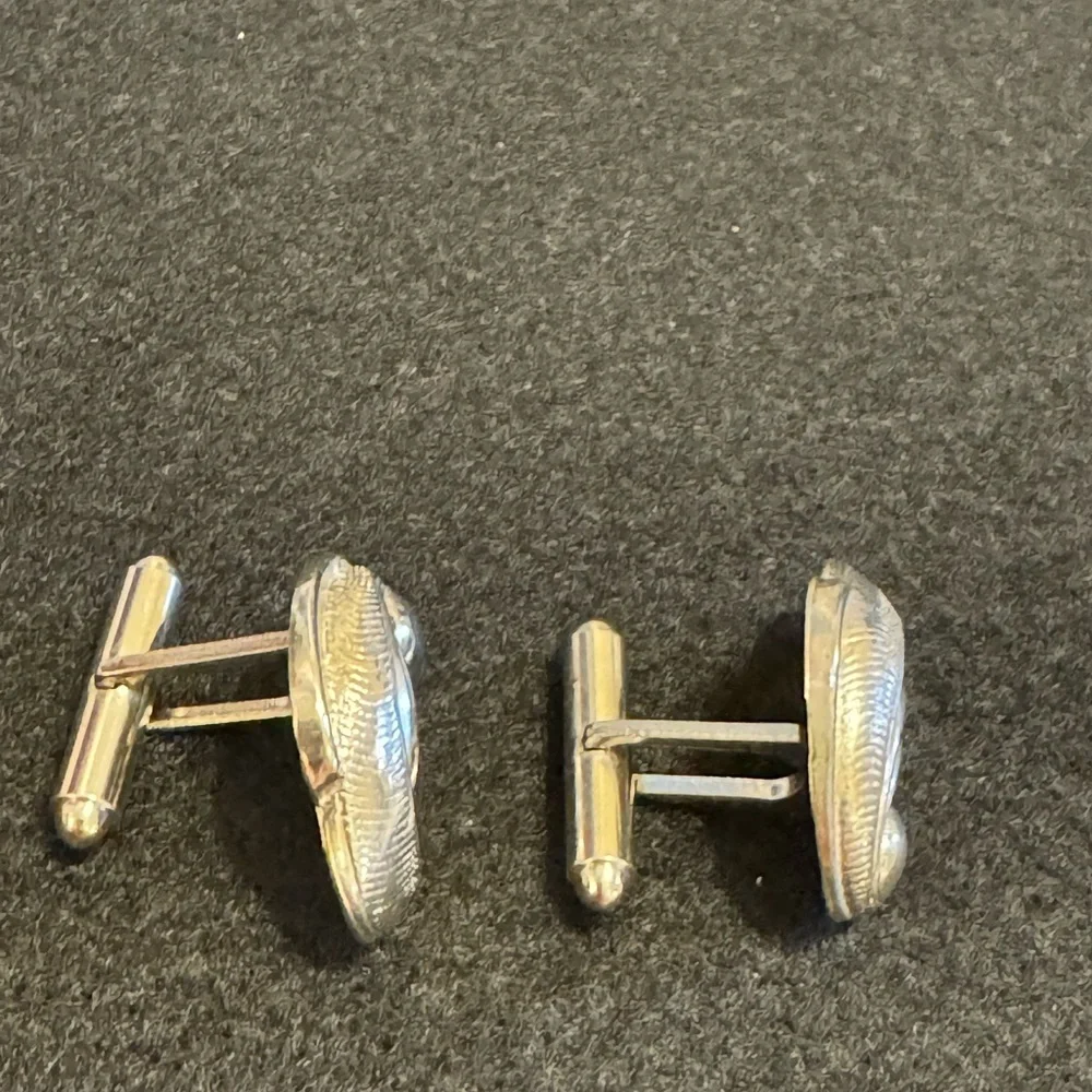 Men’s stamped sterling feather pillowy sea shell cufflinks